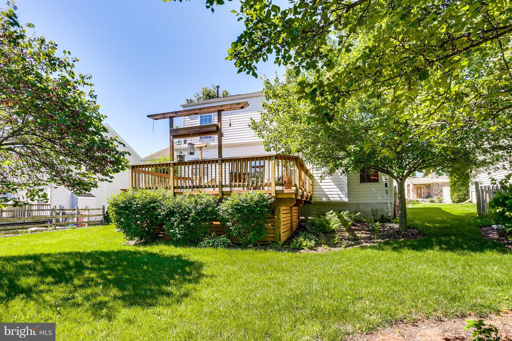 1407 Crossbow Road Mount Airy, MD 21771 - Photo 20 of 21 Landscaped Yard
