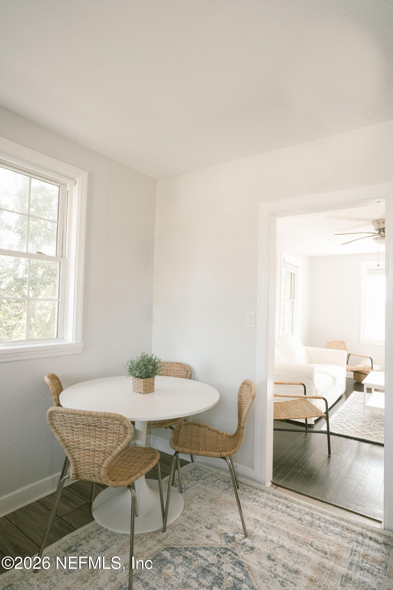 212 Oak Street Neptune Beach, FL 32266 - Photo 10 of 43 a workspace with furniture and window in a room