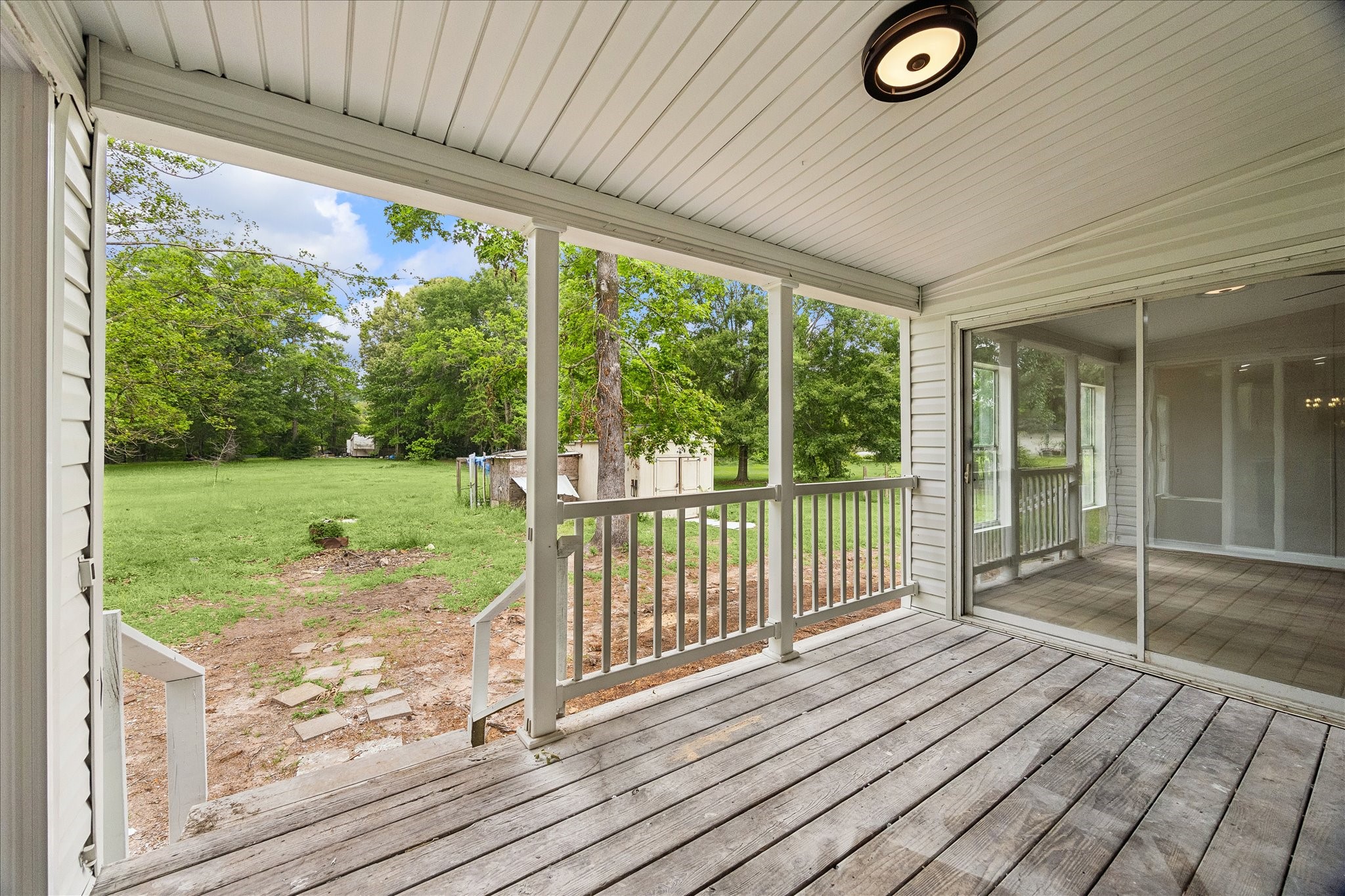 14891 Jim Stowe Road Conroe, TX 77302 - Photo 5 of 23 Covered back porch