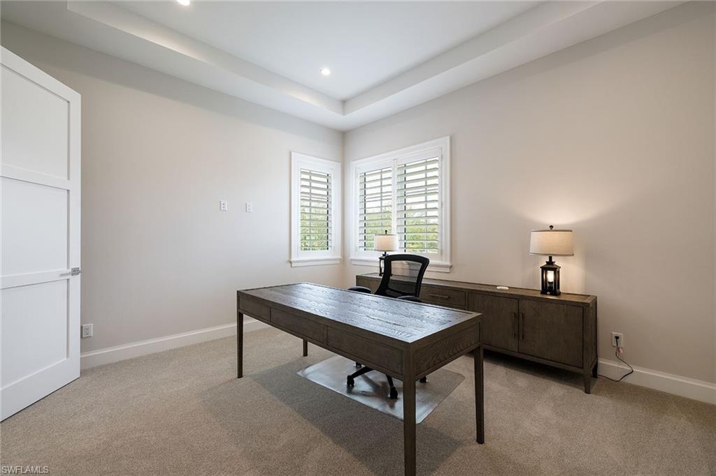 16776 Enclave Circle Naples, FL 34110 - Photo 18 of 50 a workspace with furniture and window