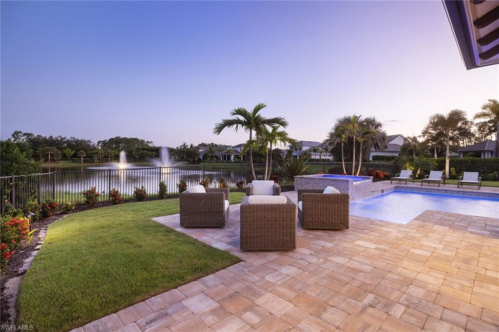 16776 Enclave Circle Naples, FL 34110 - Photo 43 of 50 a view of a garden with lake view