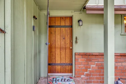 a view of an entryway with fireplace