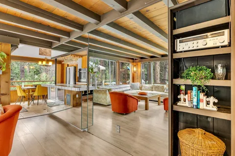 a view of a dining room with furniture window and outside view
