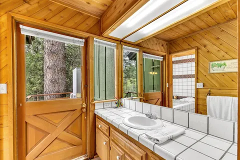 a bathroom with a bathtub and shower