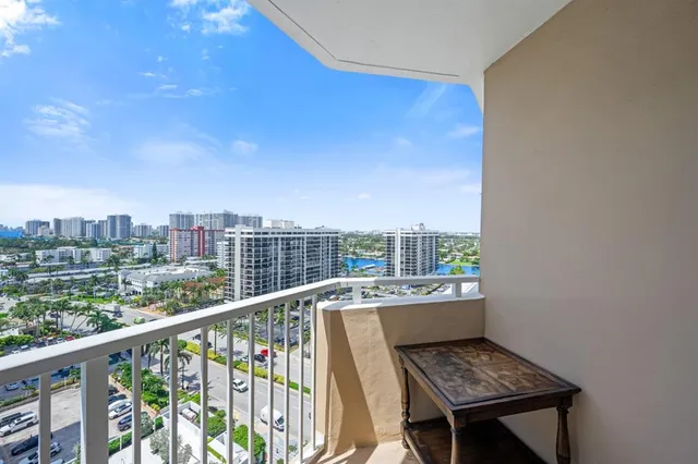 a view of a balcony with city view