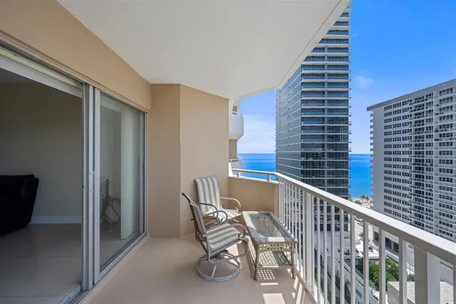 a view of balcony with furniture
