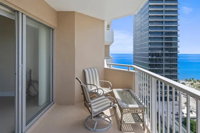 a view of a hallway with seating area