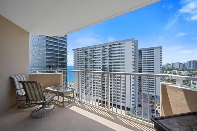 a view of a balcony with chair