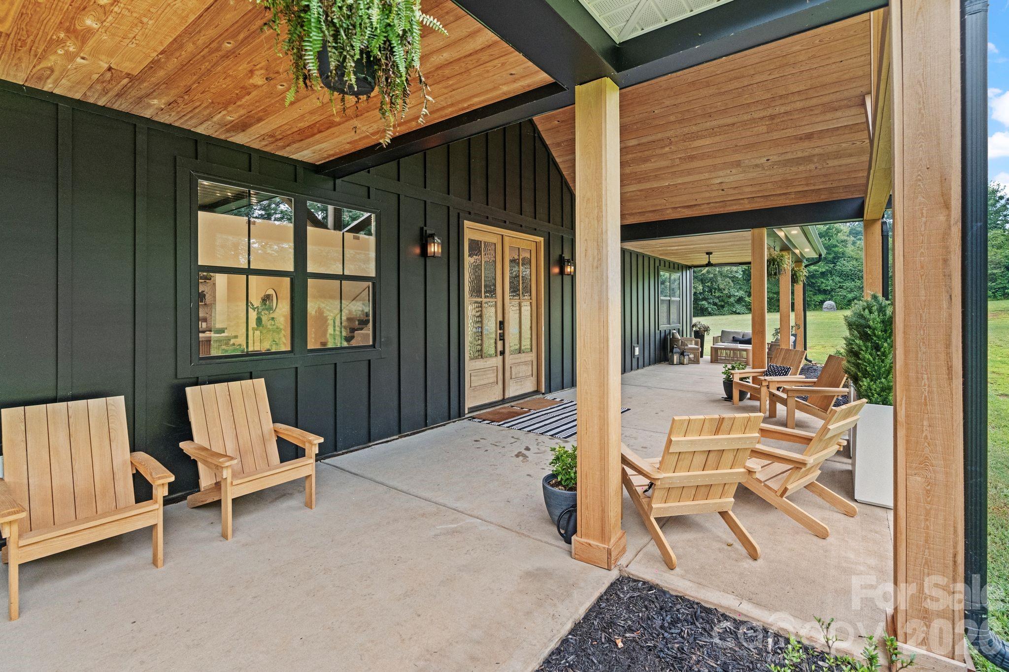 13546 State Highway 55 York, SC 29745 - Photo 11 of 48 a building outdoor space with patio furniture and potted plants
