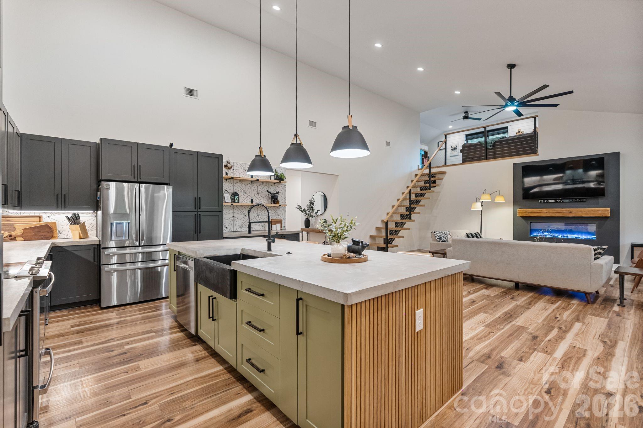 13546 State Highway 55 York, SC 29745 - Photo 21 of 48 a kitchen with stainless steel appliances granite countertop a sink a stove and a refrigerator