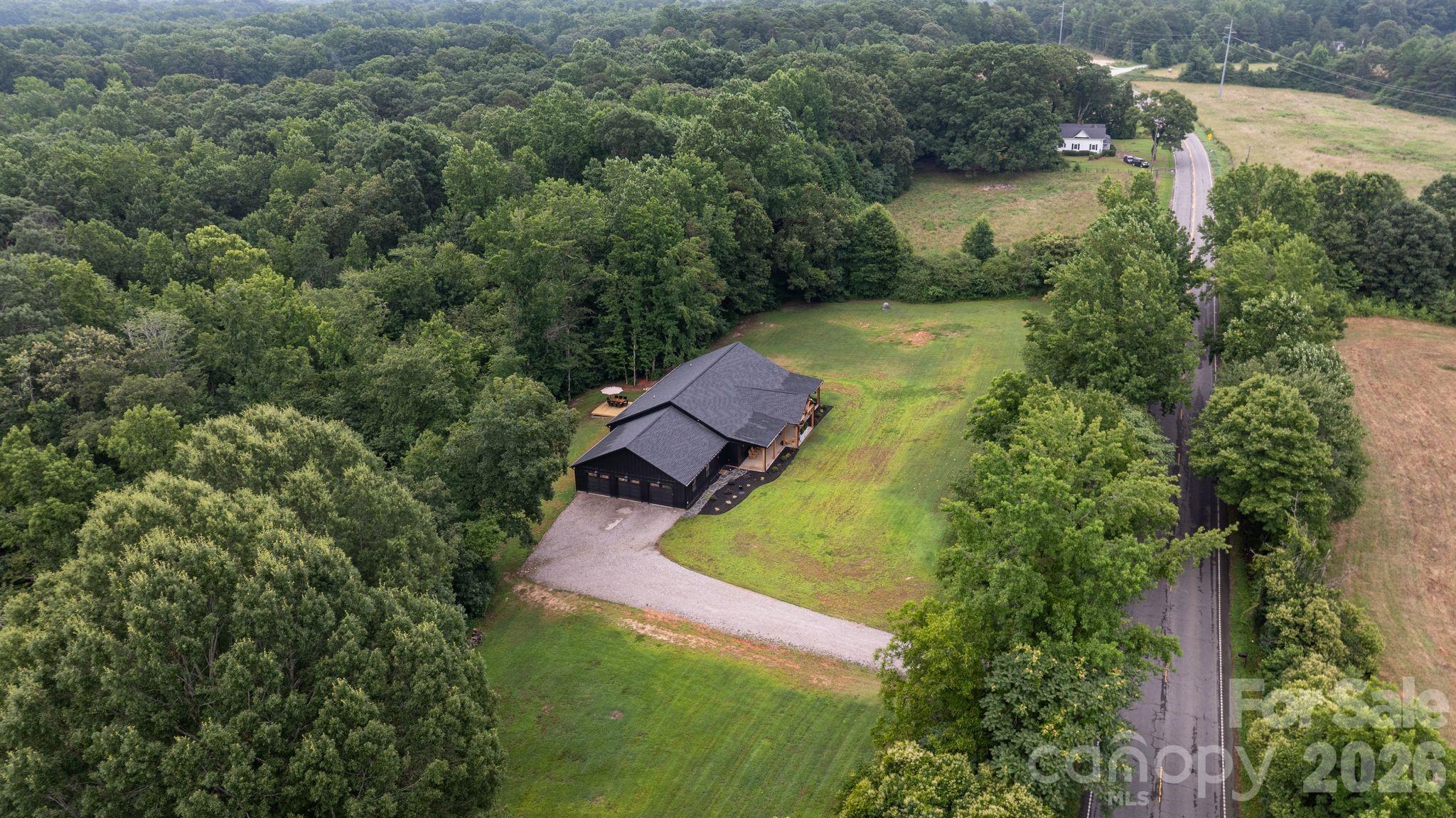 13546 State Highway 55 York, SC 29745 - Photo 3 of 48 an aerial view of house with yard swimming pool and outdoor seating