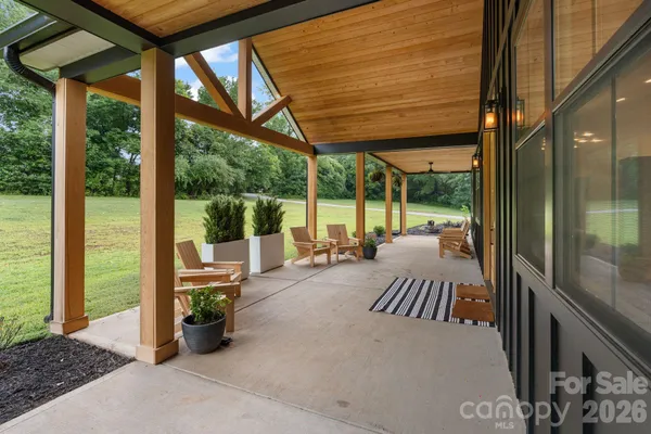 a backyard of a house with seating space