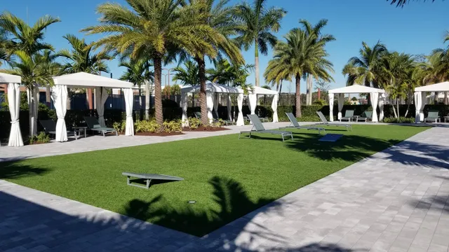 a view of swimming pool with a table and chairs