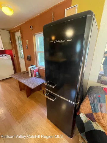 a room with gym equipment and a mirror