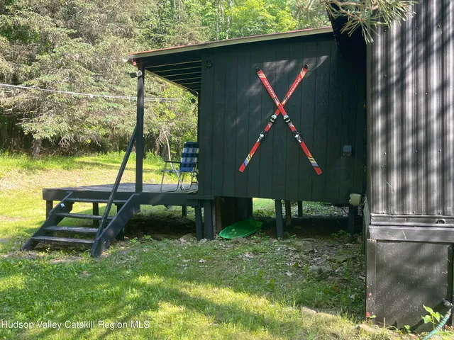 a view of playground with a slide and swing