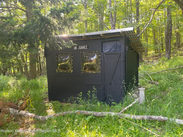 a front view of house with garden
