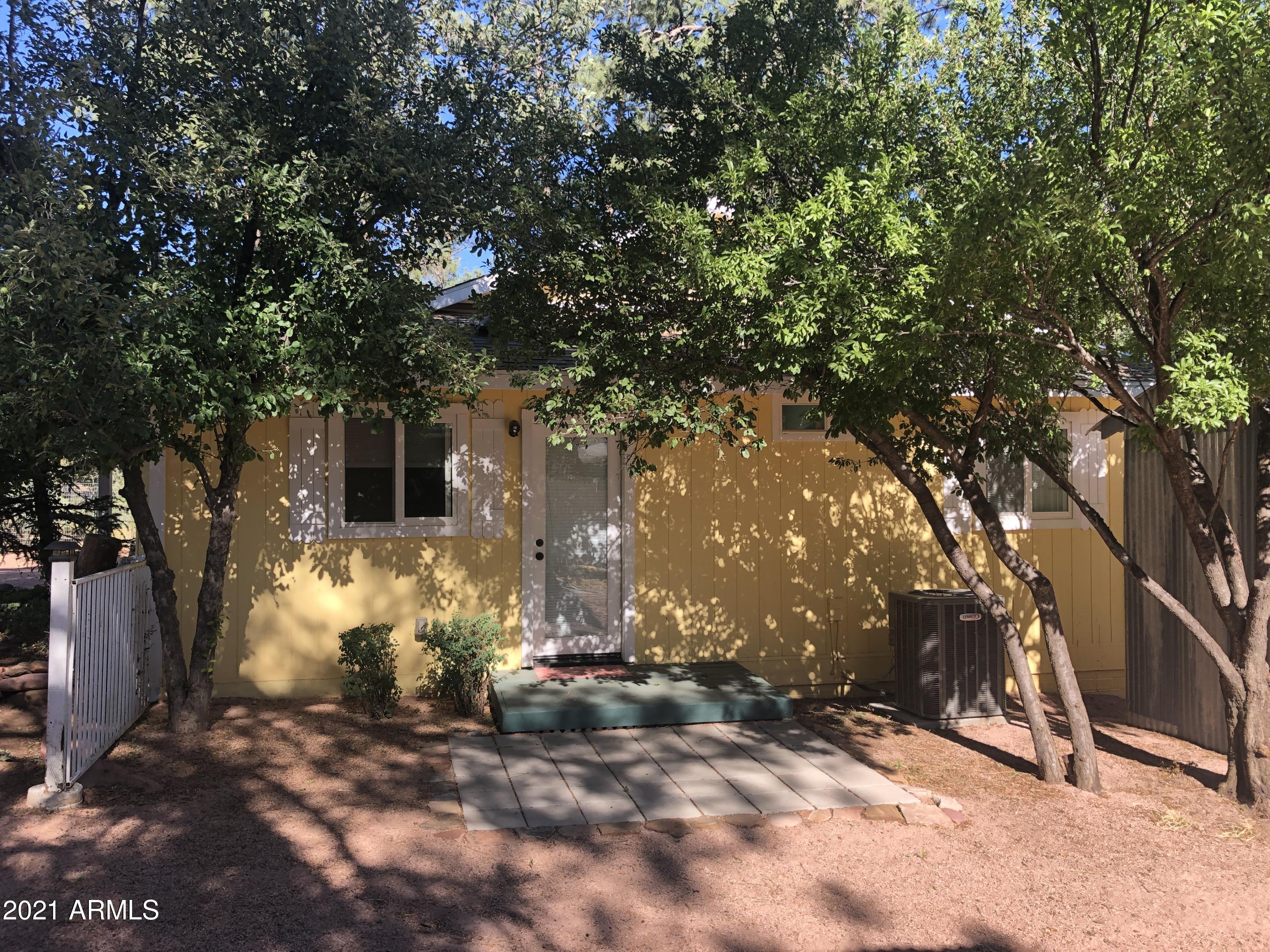 9225 Fossil Creek Road Strawberry, AZ 85544 - Photo 27 of 36 W side patio with door to MBR