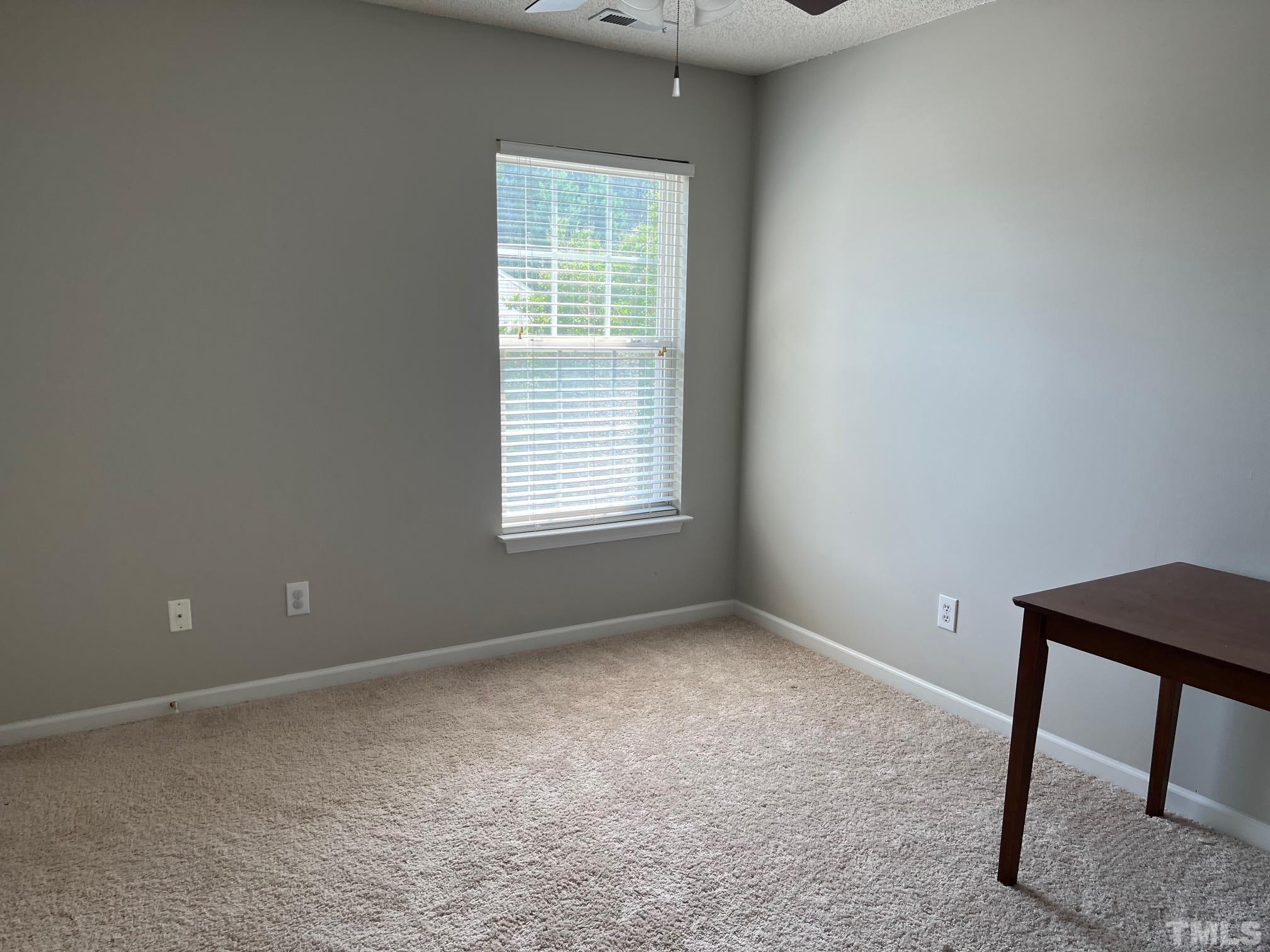 302 Durston Loop Morrisville, NC 27560 - Photo 17 of 21 a view of an empty room with a window