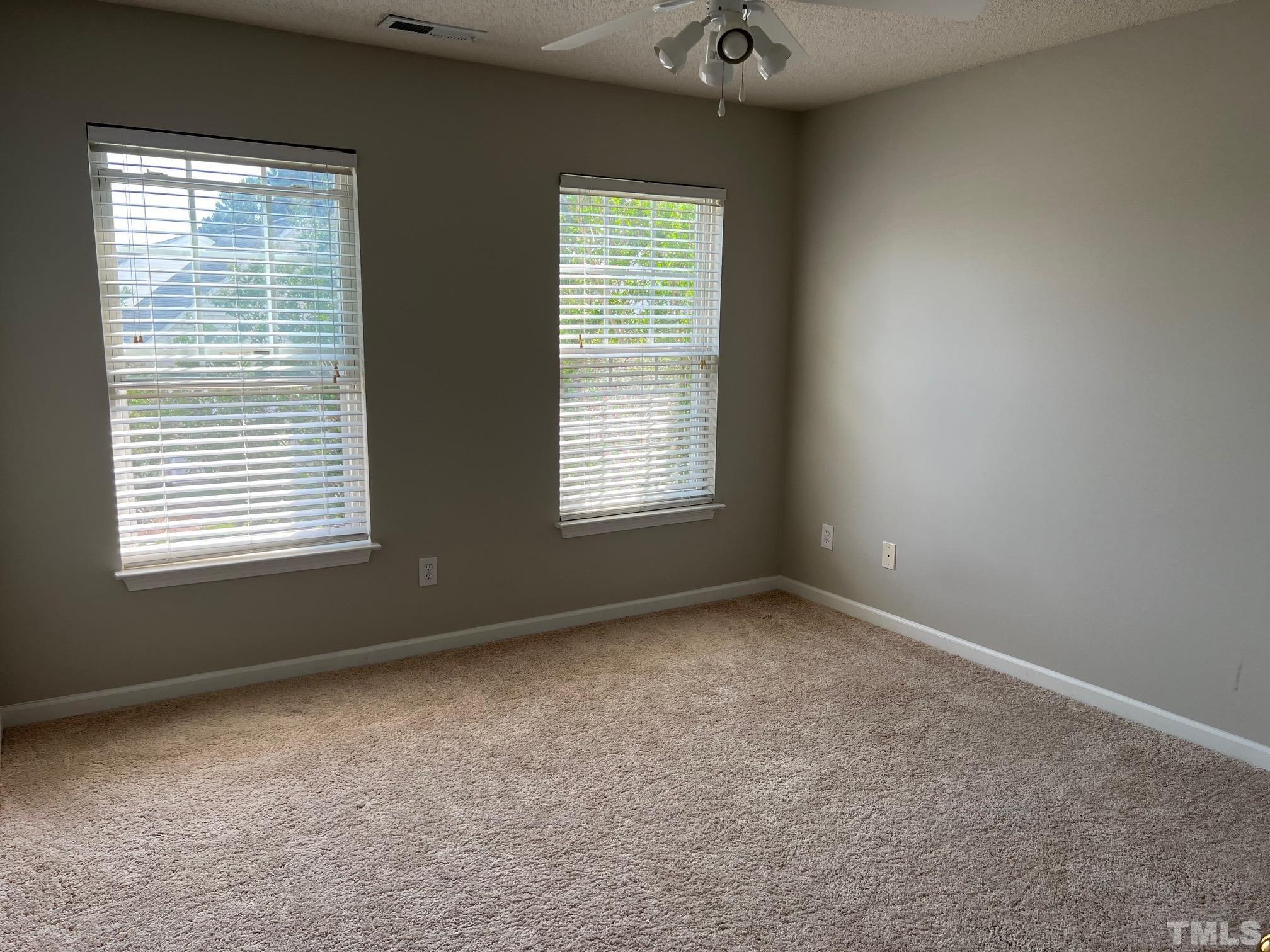 302 Durston Loop Morrisville, NC 27560 - Photo 18 of 21 an empty room with a window