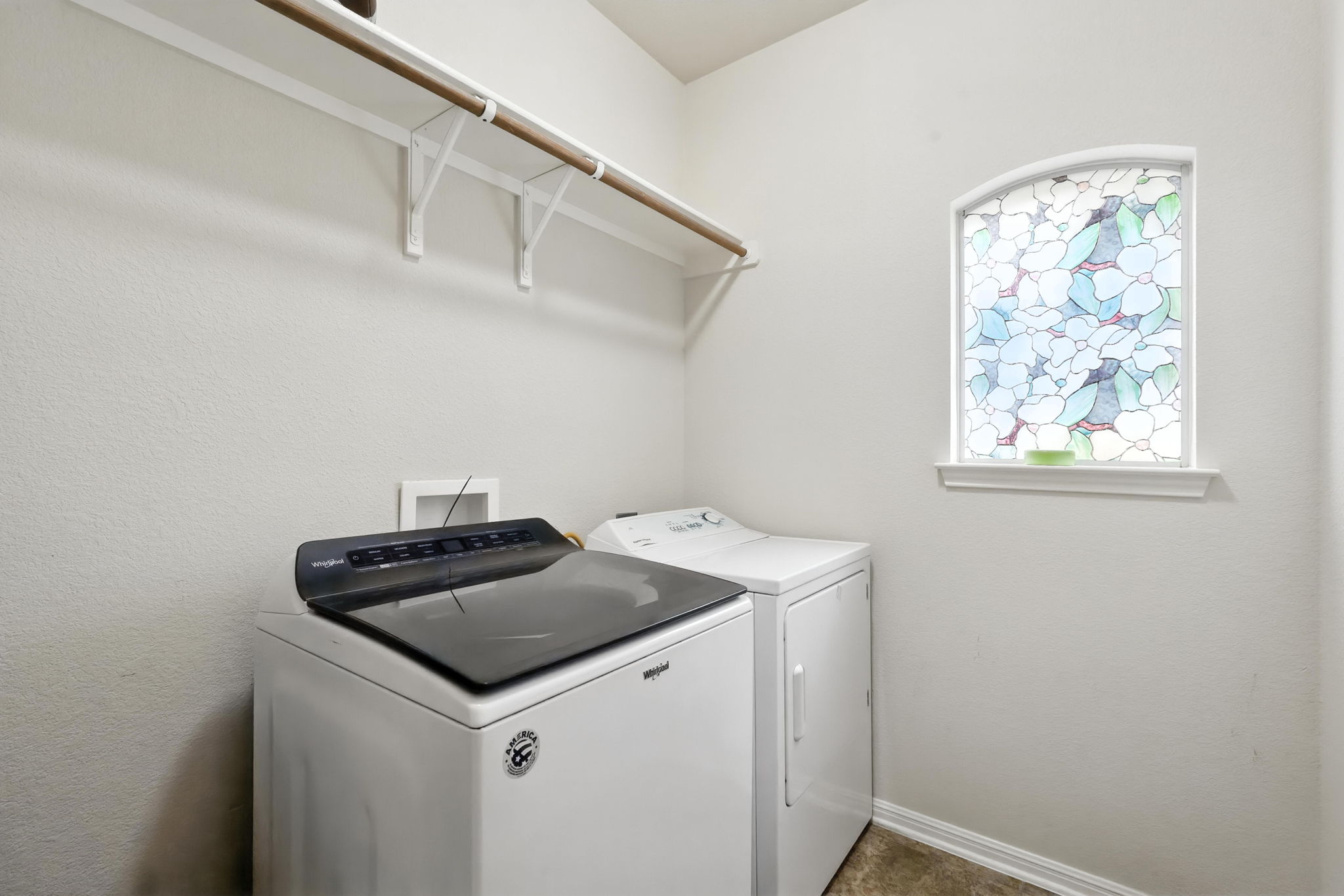 1802 Misty Ridge Leander, TX 78641 - Photo 33 of 39 Laundry room with washer and clothes dryer and baseboards