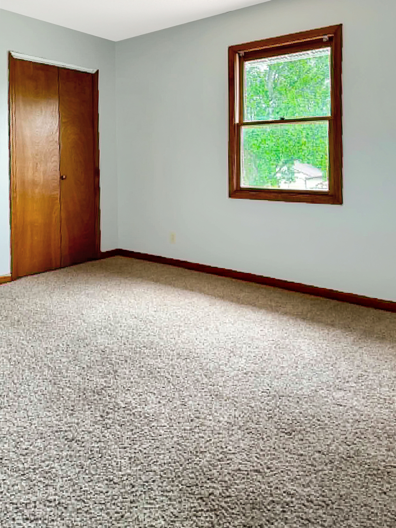 1008 Ascot Drive Rantoul, IL 61866 - Photo 18 of 24 an empty room with a window