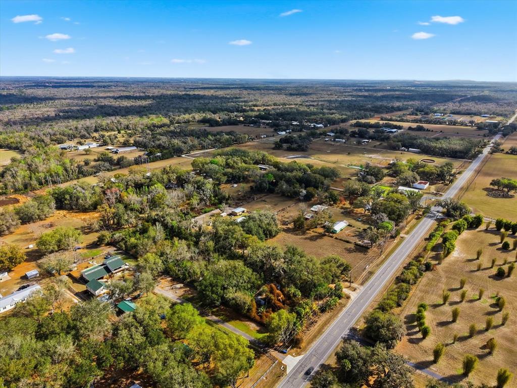 8529 Lithia Pinecrest Road Lithia, FL 33547 - Photo 5 of 12 an aerial view of residential building and ocean view