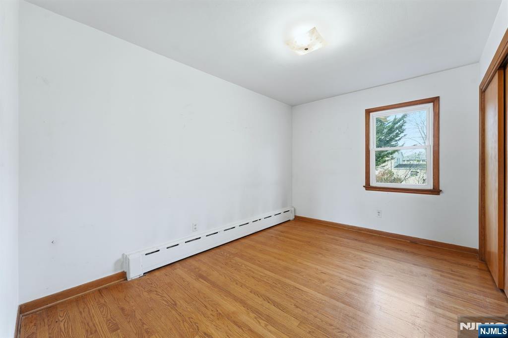 5 Dogwood Road Netcong, NJ 07857 - Photo 13 of 35 an empty room with wooden floor and window