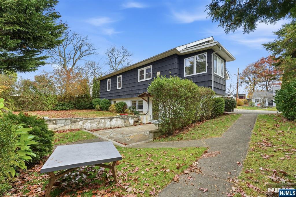 5 Dogwood Road Netcong, NJ 07857 - Photo 34 of 35 a front view of a house with a yard and garage