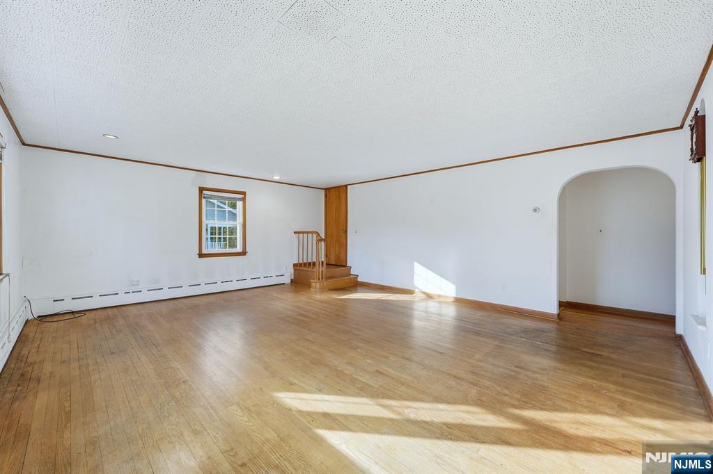 5 Dogwood Road Netcong, NJ 07857 - Photo 5 of 35 a view of a livingroom with wooden floor and window