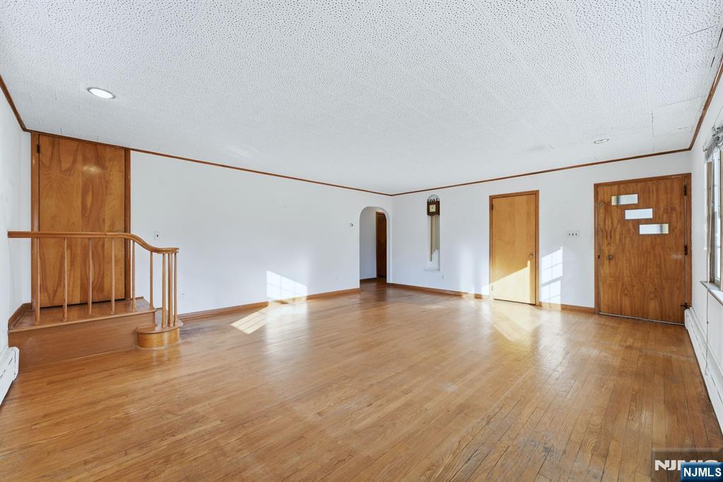 5 Dogwood Road Netcong, NJ 07857 - Photo 7 of 35 a view of empty room with wooden floor and fan