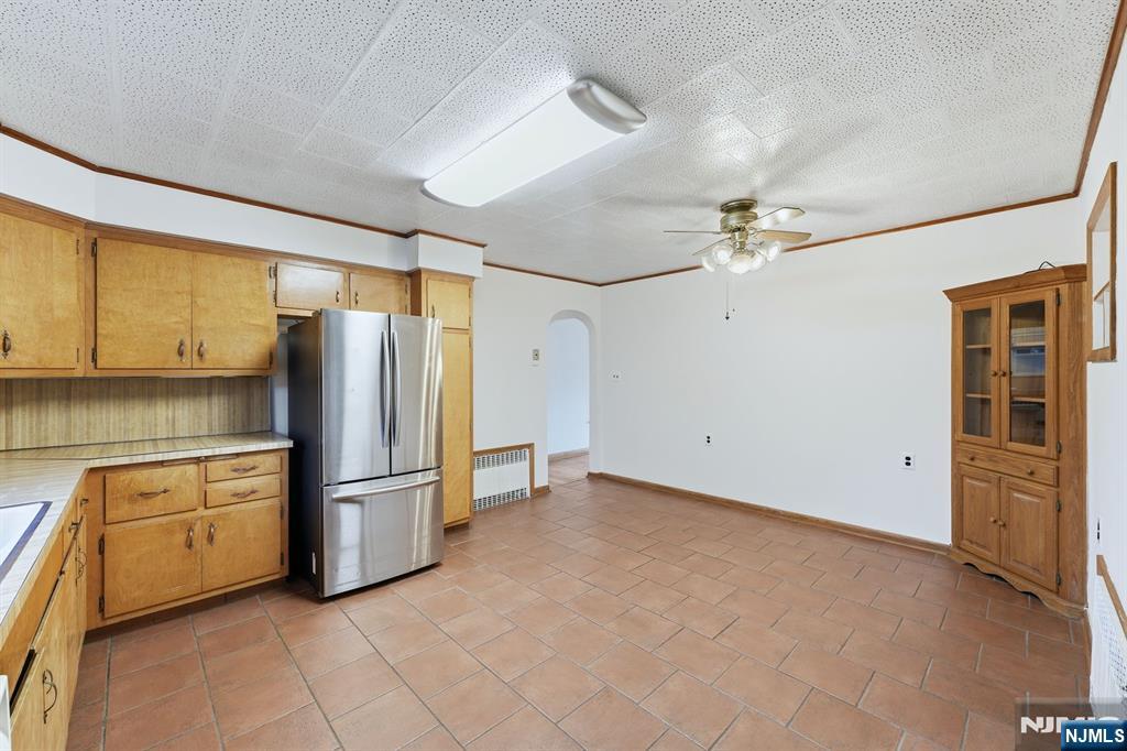 5 Dogwood Road Netcong, NJ 07857 - Photo 10 of 35 a kitchen with stainless steel appliances a refrigerator and cabinets
