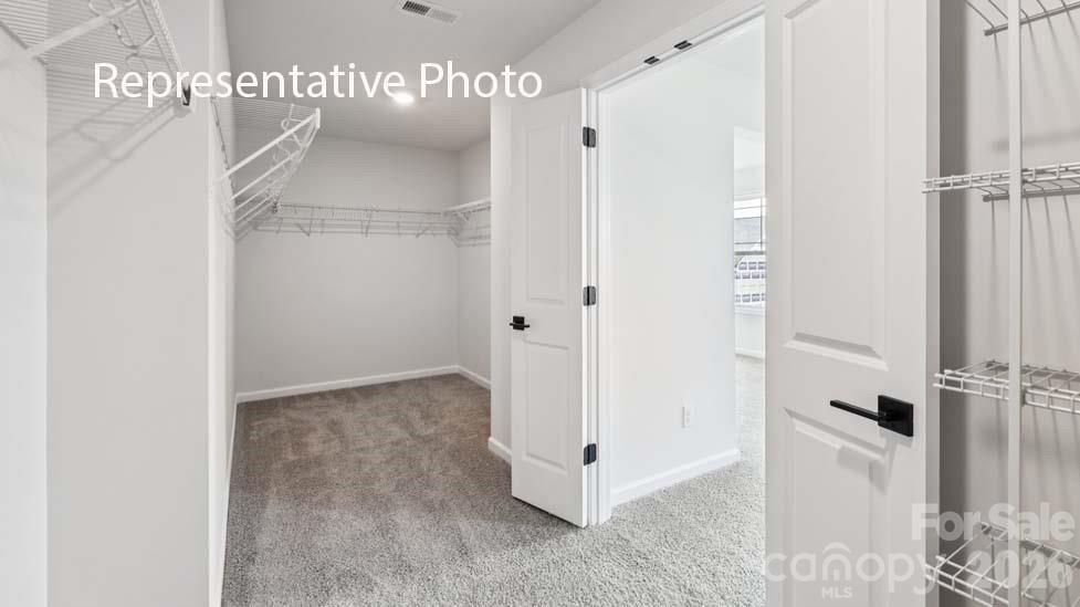 7621 Bainbridge Road Sherrills Ford, NC 28673 - Photo 30 of 34 a view of a hallway with closet