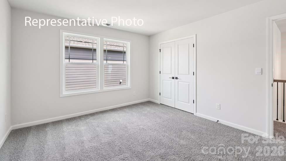 7621 Bainbridge Road Sherrills Ford, NC 28673 - Photo 32 of 34 a view of an empty room with a window