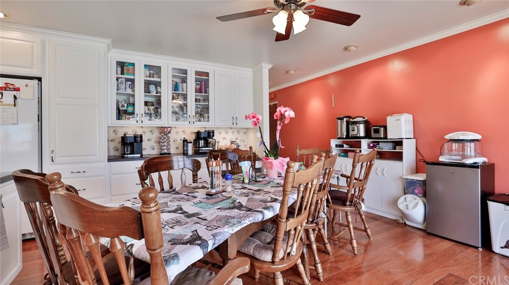 1102 Eucalyptus Drive El Cajon, CA 92020 - Photo 13 of 63 a view of a dining room with furniture and chandelier