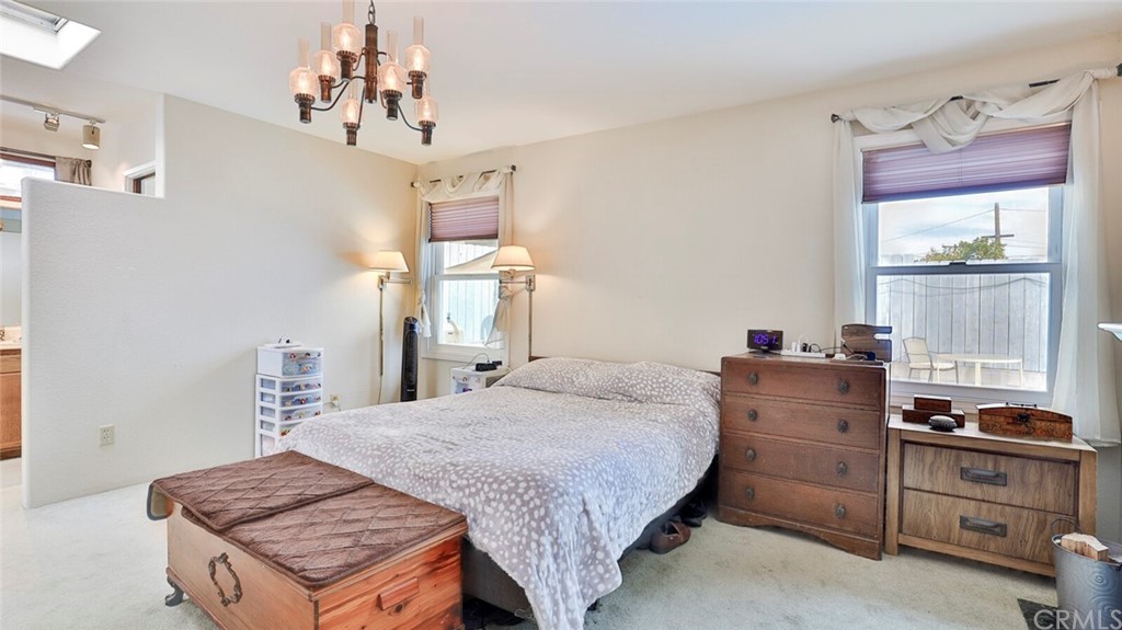 1102 Eucalyptus Drive El Cajon, CA 92020 - Photo 23 of 63 a bedroom with a bed and a window in it