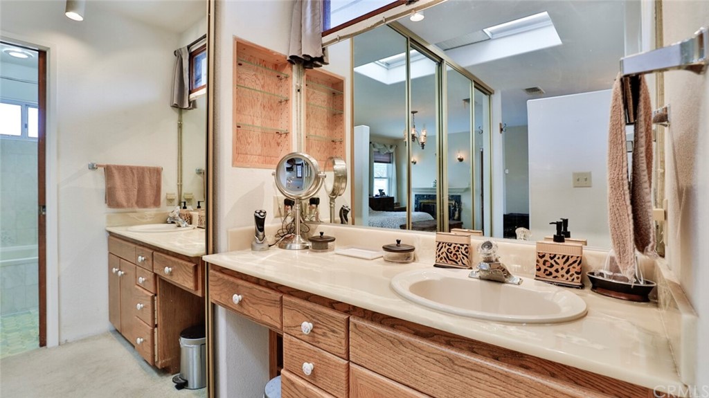 1102 Eucalyptus Drive El Cajon, CA 92020 - Photo 26 of 63 a bathroom with a double vanity sink mirror and double