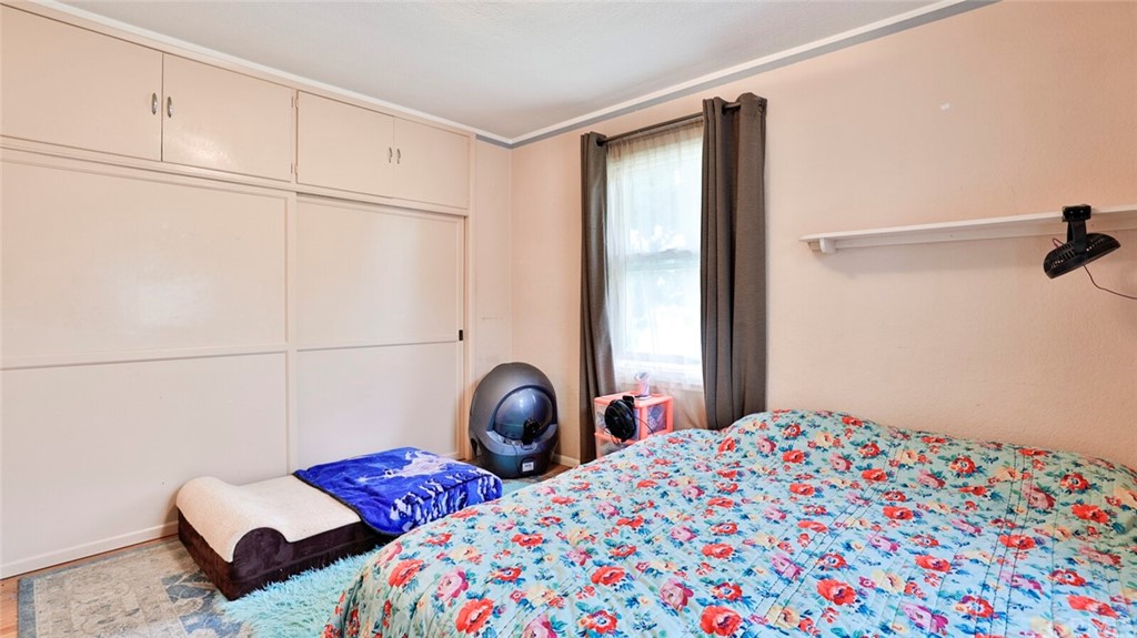 1102 Eucalyptus Drive El Cajon, CA 92020 - Photo 30 of 63 a bedroom with bed and a window