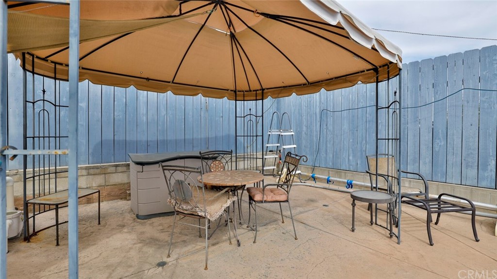 1102 Eucalyptus Drive El Cajon, CA 92020 - Photo 47 of 63 a table and chairs in the patio