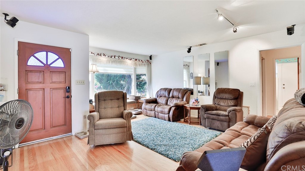 1102 Eucalyptus Drive El Cajon, CA 92020 - Photo 10 of 63 a living room with furniture and a large window