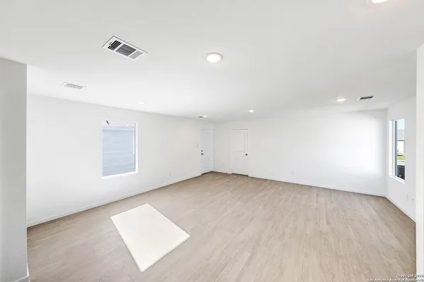 an empty room with a window