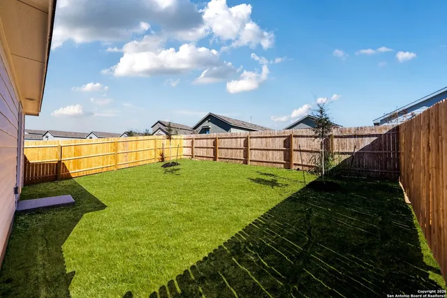 a view of outdoor space and yard