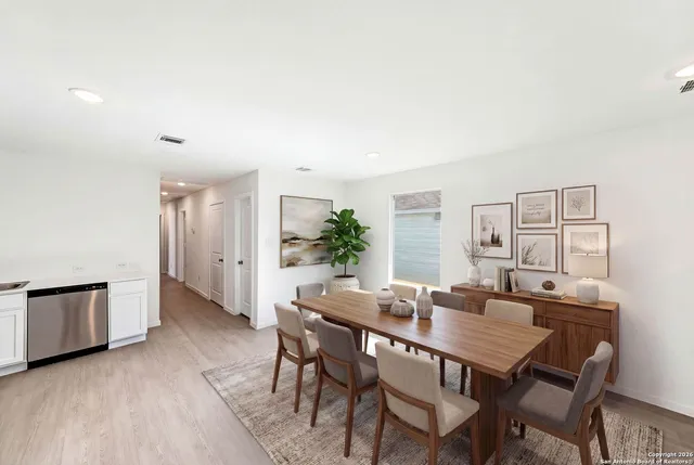 a view of a dining room with furniture