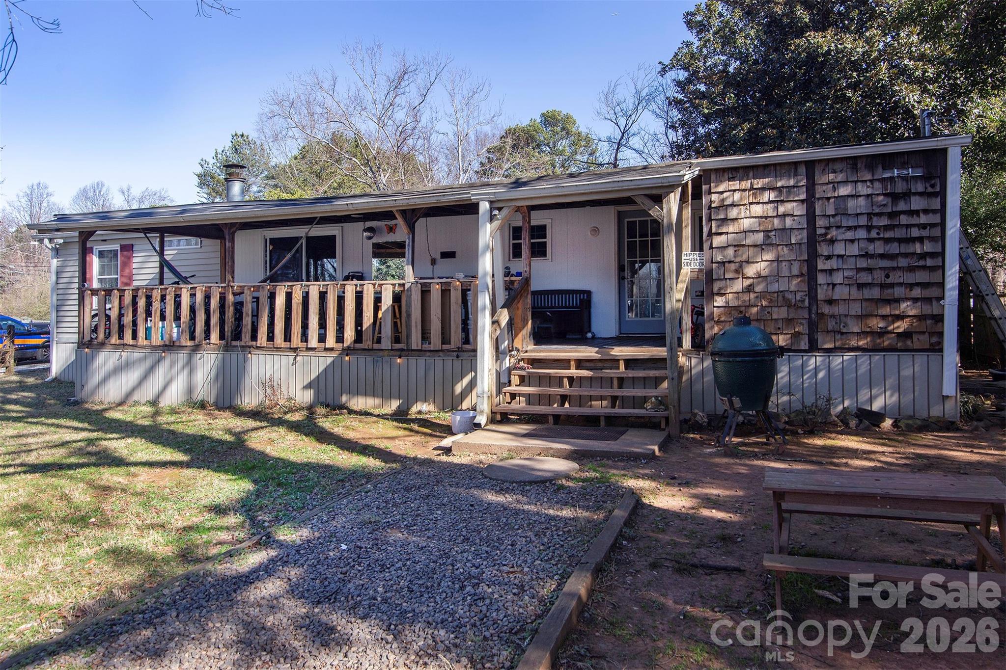 5727 Thompson Road Charlotte, NC 28216 - Photo 20 of 21 a view of a house with backyard and wooden fence