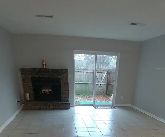 a living room with a fireplace