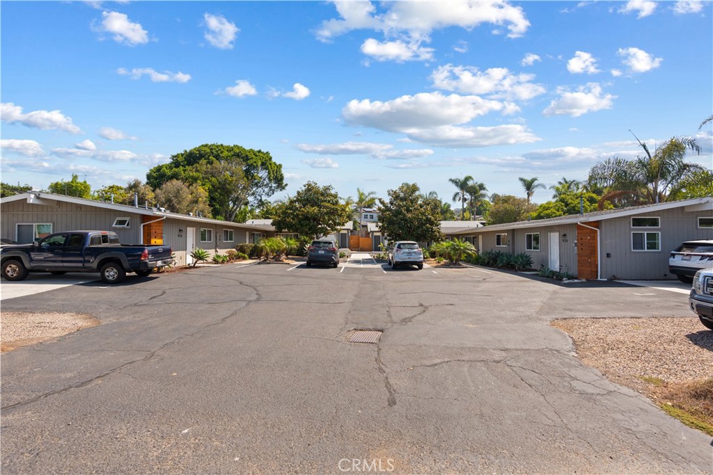 921 Regal Road Encinitas, CA 92024 - Photo 16 of 23 a view of street with parked cars