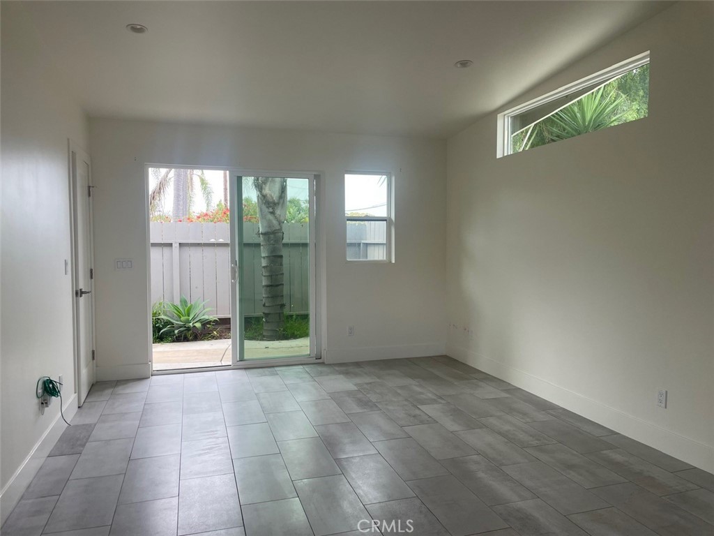 921 Regal Road Encinitas, CA 92024 - Photo 20 of 23 an empty room with windows
