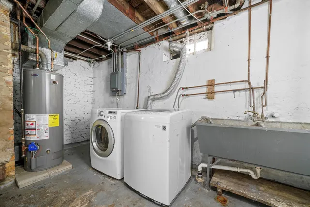 a utility room with dryer and washer