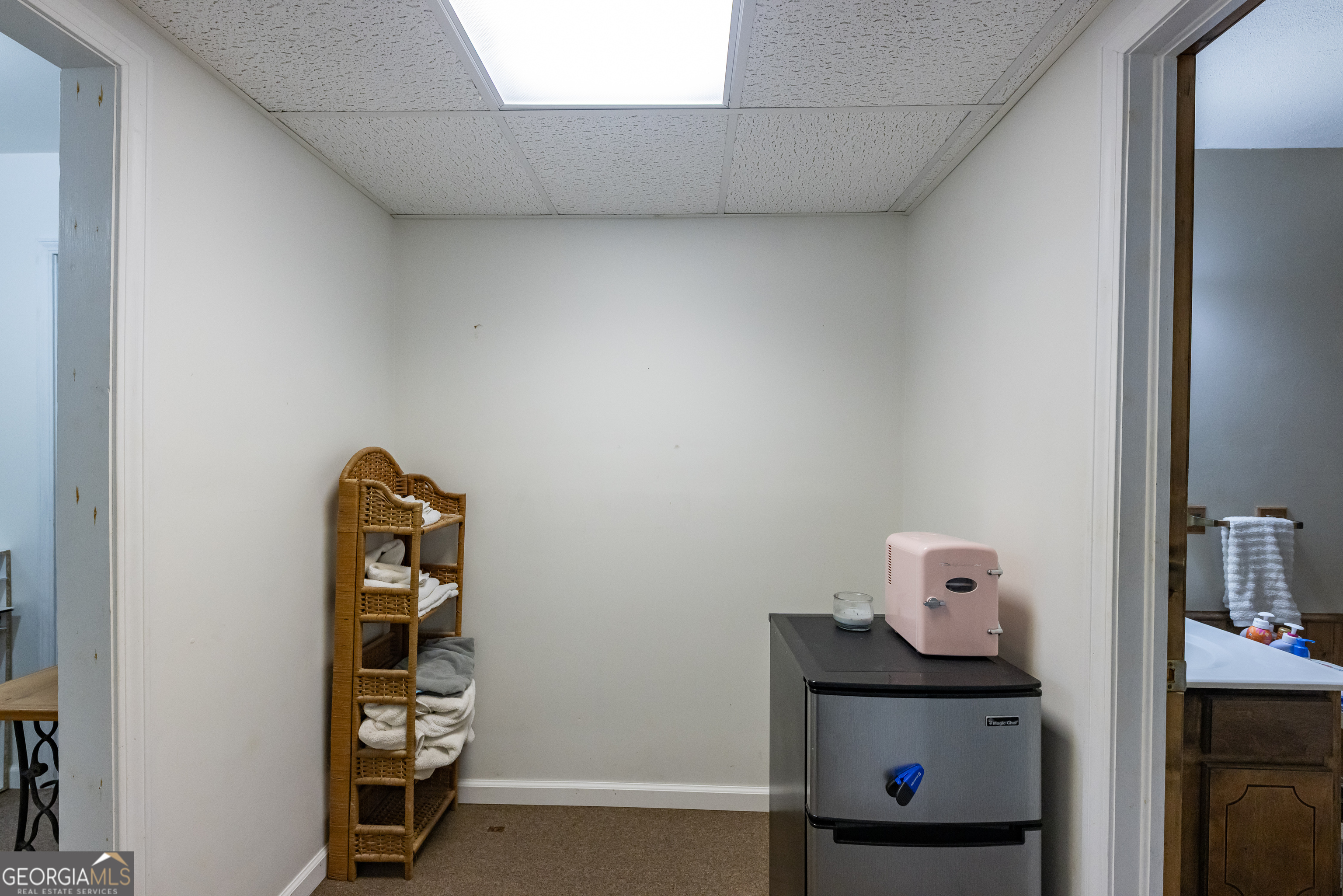 976 Windsweep Farm Road Thomaston, GA 30286 - Photo 28 of 98 a view of room with racks on the wall and a window