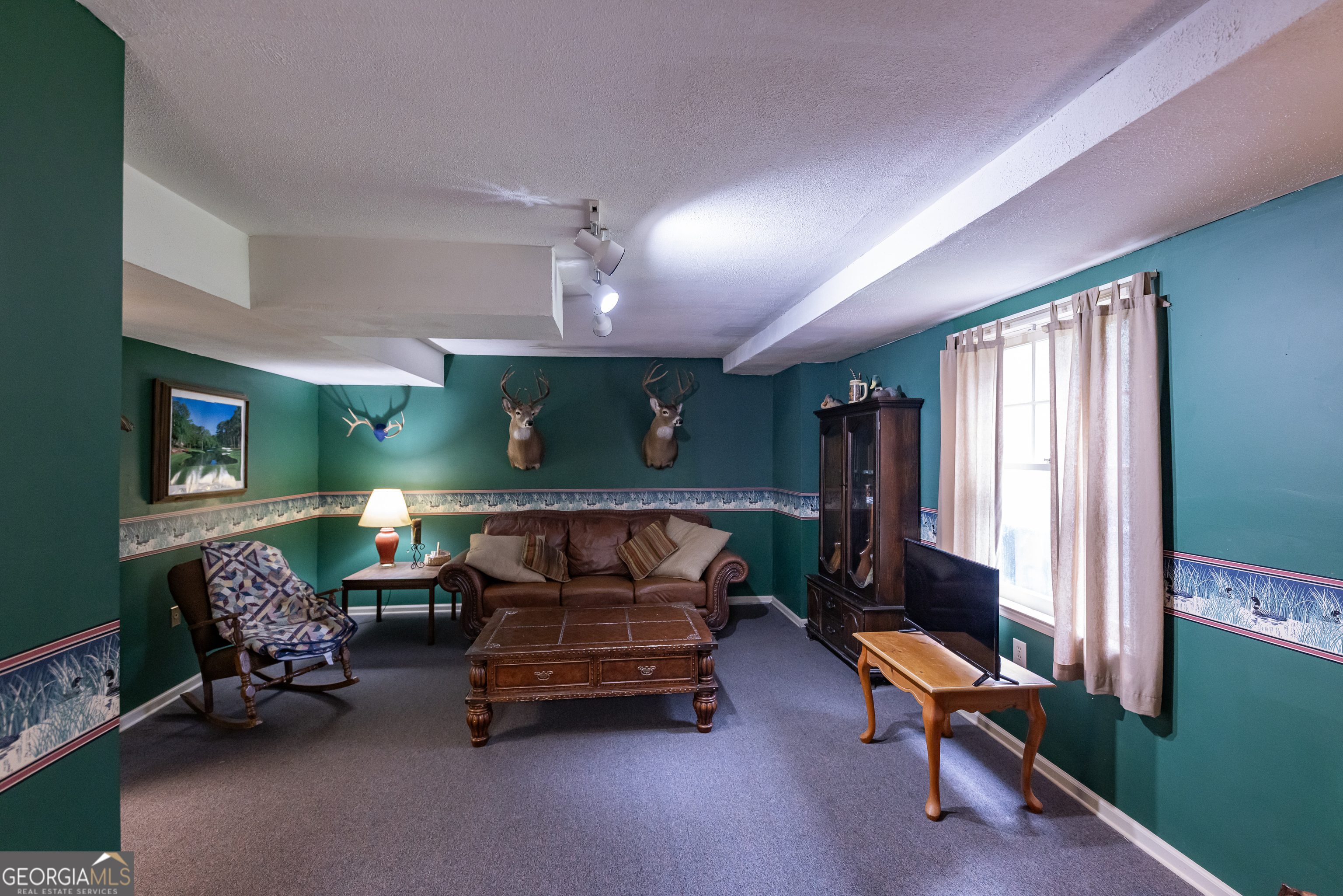 976 Windsweep Farm Road Thomaston, GA 30286 - Photo 29 of 98 a bedroom with furniture and a window