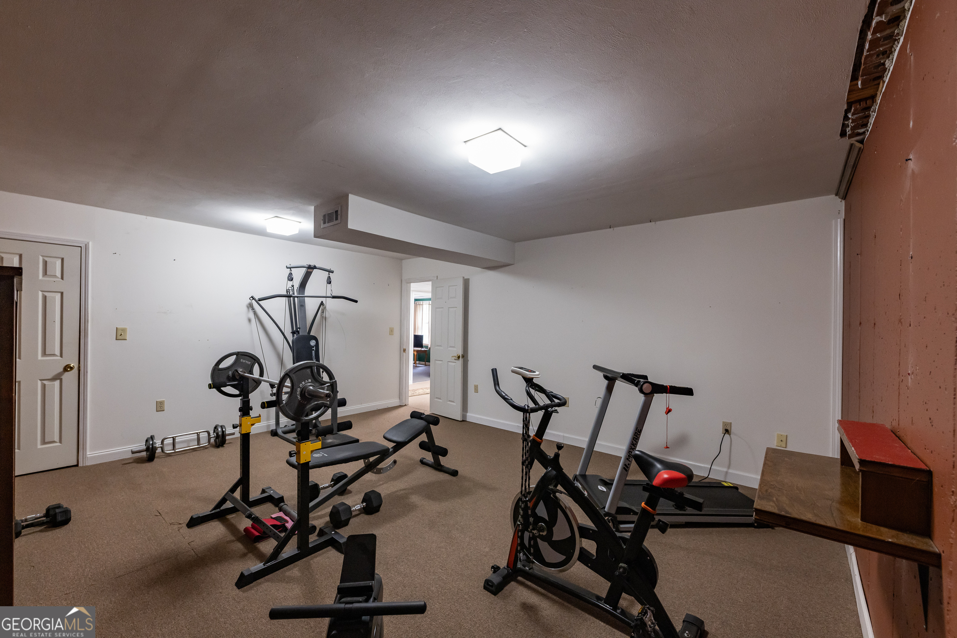 976 Windsweep Farm Road Thomaston, GA 30286 - Photo 37 of 98 a view of a room with gym equipment